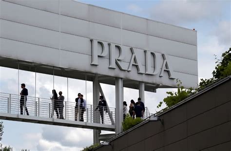 prada shows signs of turnaround with first-half sales growth|Prada Is Beating the Odds — and Bucking the Luxury Slump.